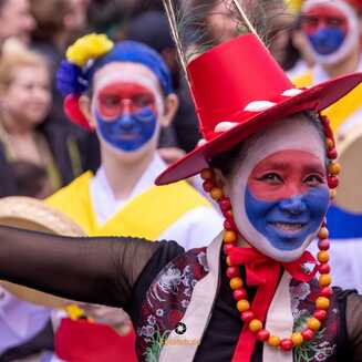 a group of people with face paint