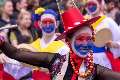 a group of people with face paint