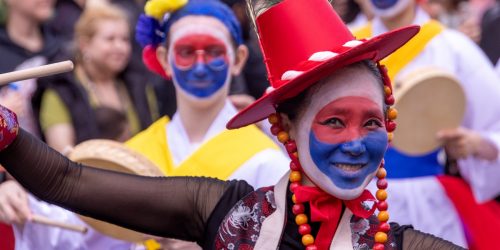a group of people with face paint